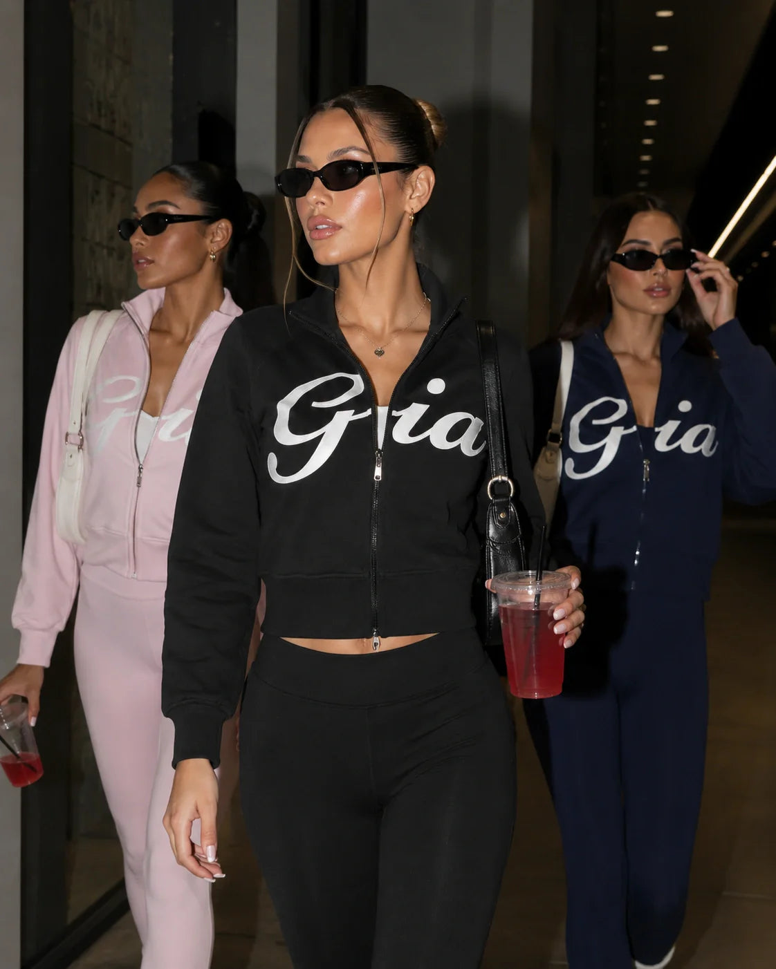 four women wearing different colored two-piece matching sets from Urbanistar