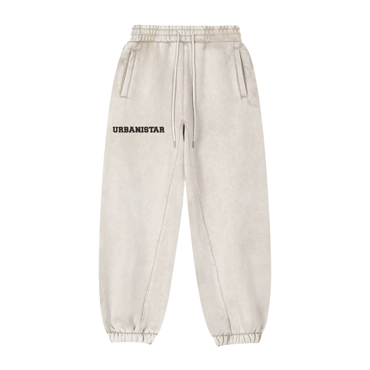 Beige sweatpants with 'URBANISTAR' logo on a white background