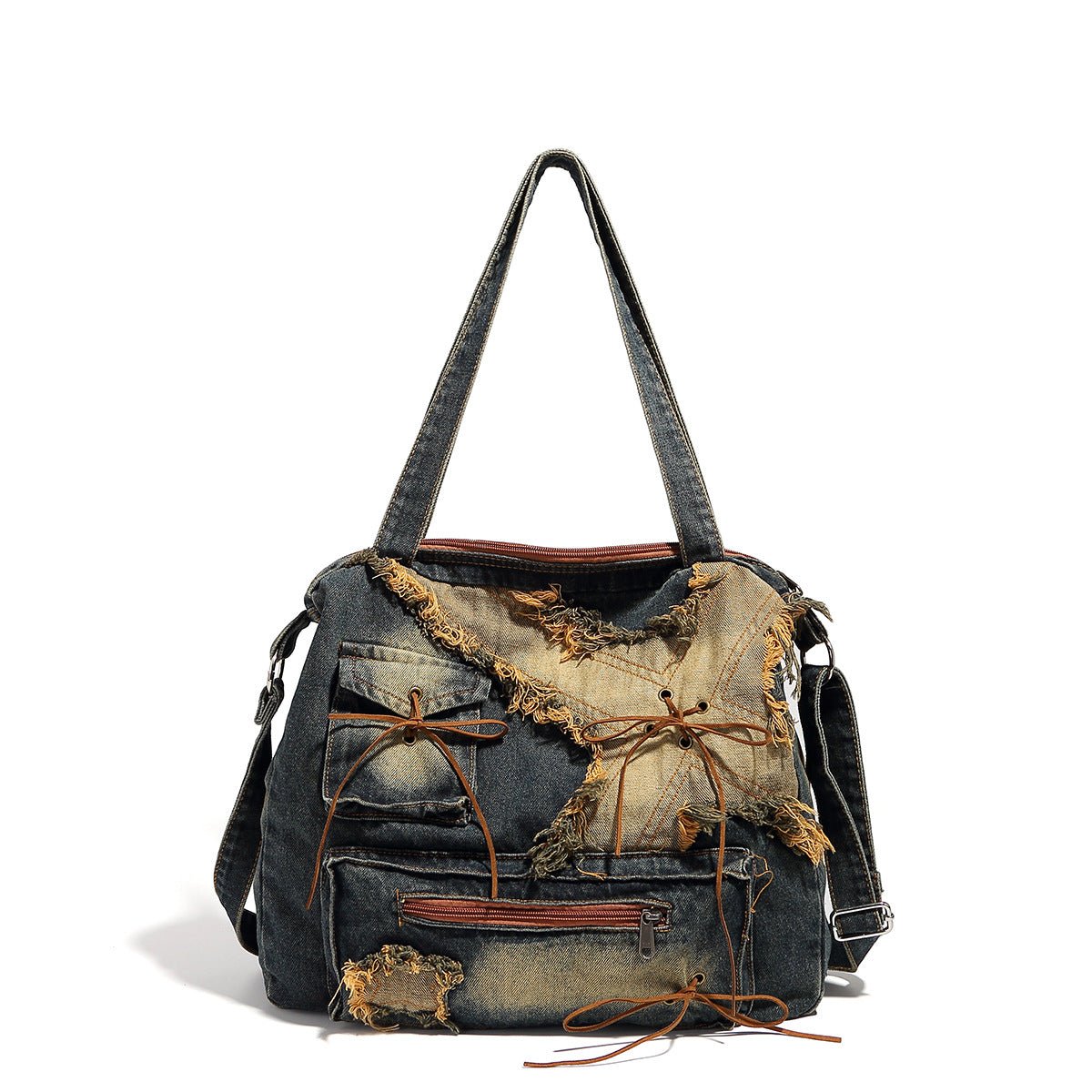 Denim handbag with distressed details on a white background