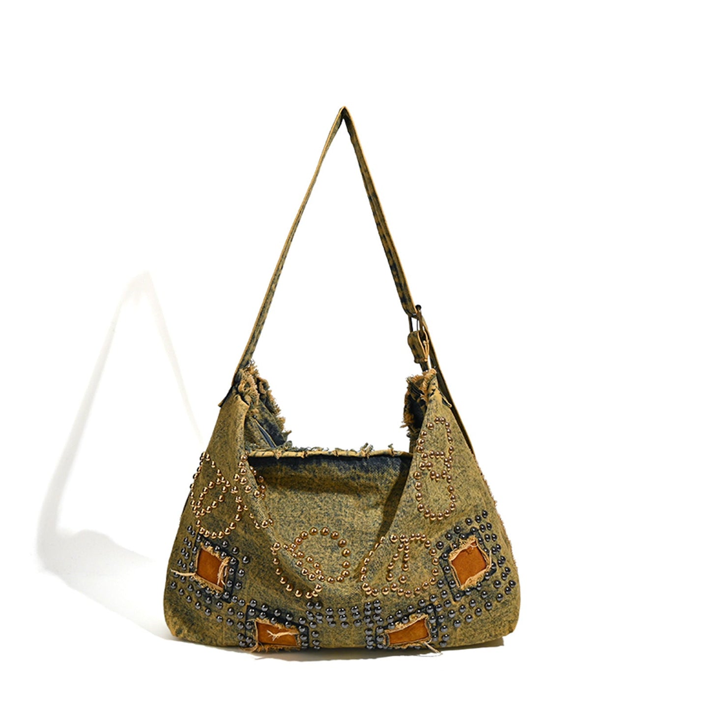 Textured handbag with decorative elements on a white background