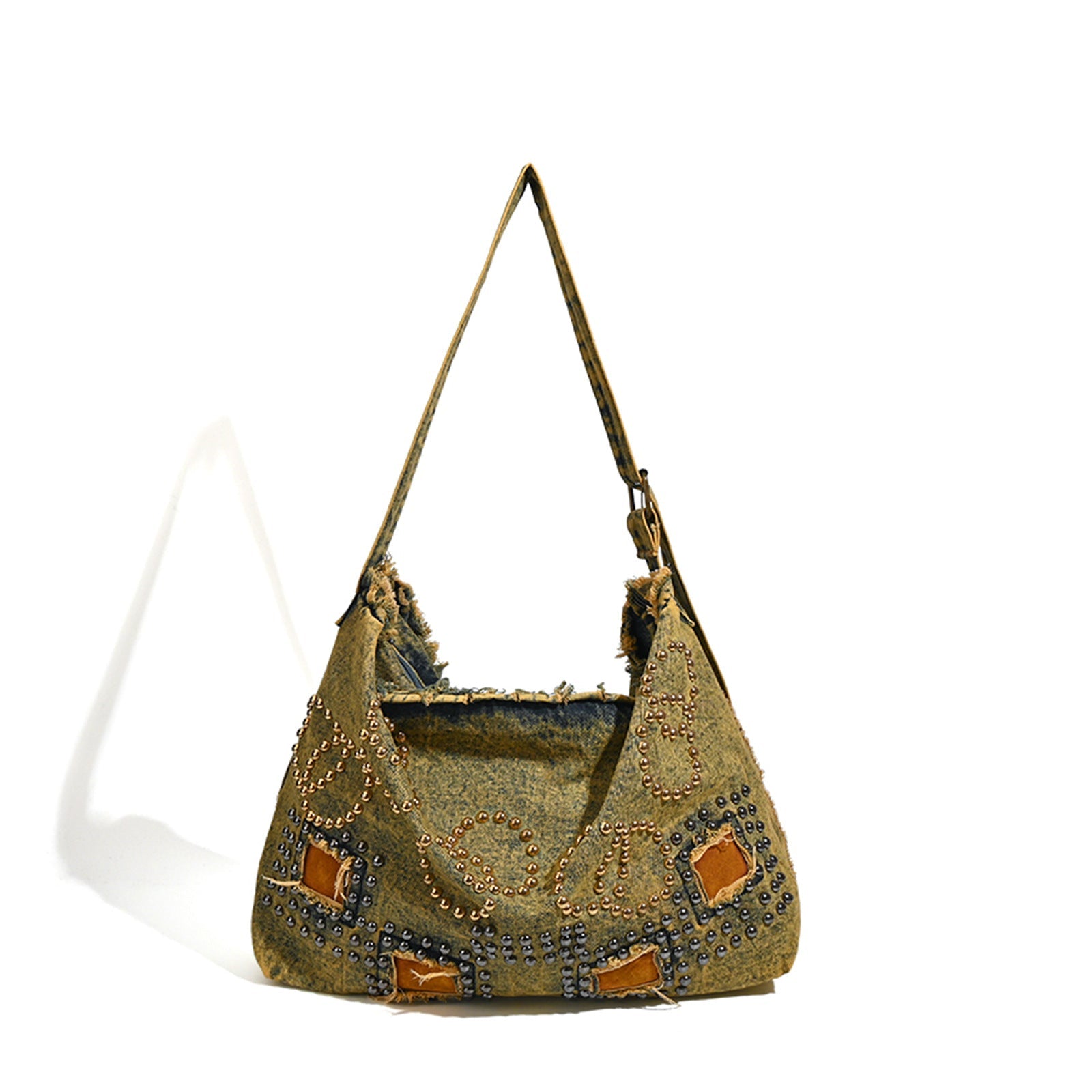 Textured handbag with decorative elements on a white background