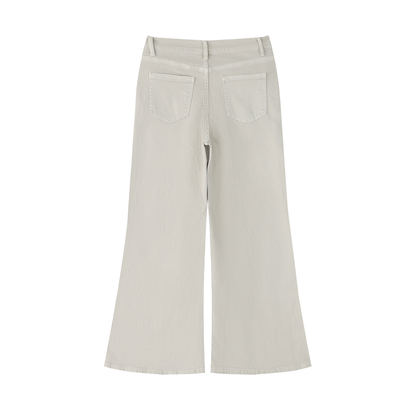 flat lay view of back of beige pants on a white background