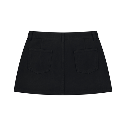 Black denim mini skirt shown from the back, featuring two large patch pockets and a straight waistband, photographed on a solid white background.