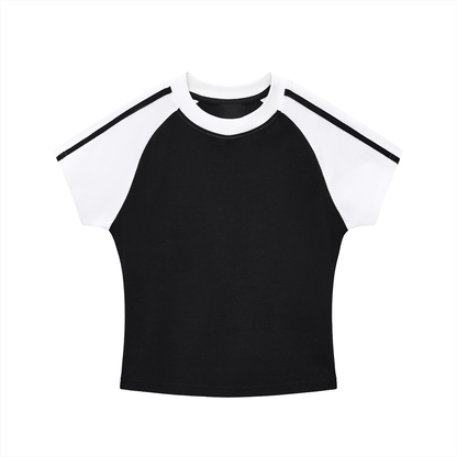 Black and white crop top with raglan sleeves on a white background