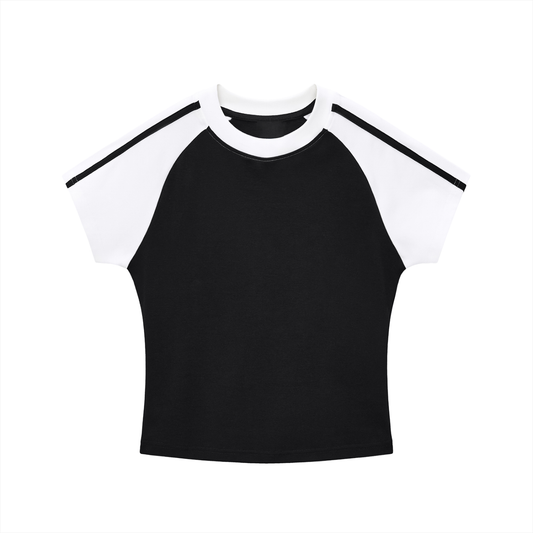 Black and white crop top with raglan sleeves on a white background