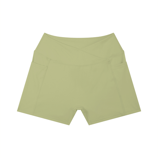 Light olive-green yoga shorts on a white background