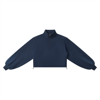A navy blue cropped quarter-zip sweatshirt shown flat against a solid white background.