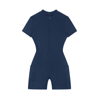 Navy blue romper with quarter zip on a white background